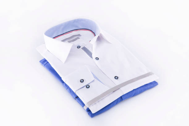istock Men's shirts folded new: white and bright blue on a white background. 840304114