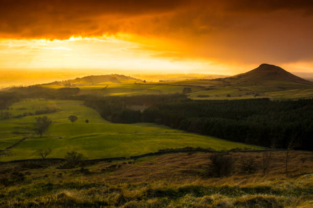 Roseberry Topping A local landmark of Roseberry Topping which towers over Teesside, England. teesside northeast england stock pictures, royalty-free photos & images
