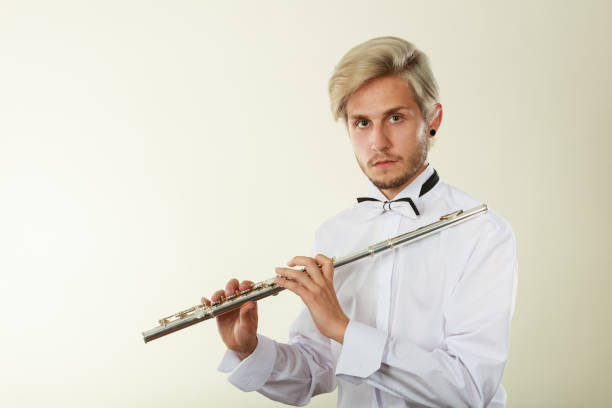 istock Flute music playing flutist musician performer 840310728