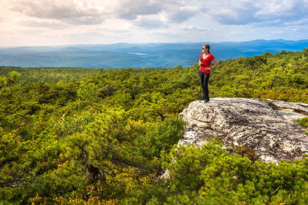 Woman enjoys the nature Woman enjoys the nature At High Point, on top of Shawangunk Ridge, in Upstate New York. orange county new york stock pictures, royalty-free photos & images