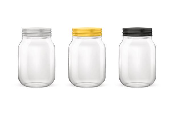 istock Vector realistic empty glass jar for canning and preserving set with silvery, golden and black lids closeup isolated on white background. Design templates for advertise, branding, mockup. EPS10 840324752