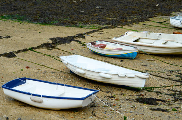 istock Boats  in a little harbor during an outflow, low water level 840325248