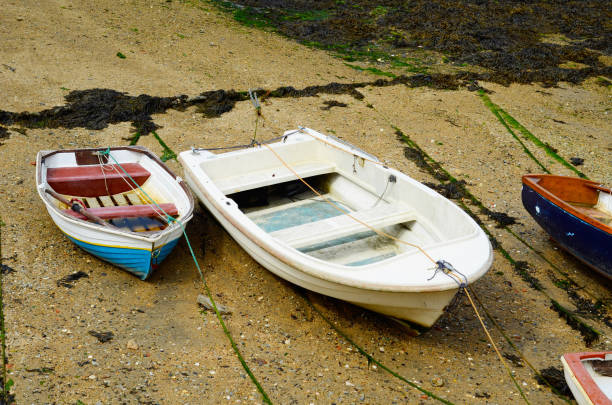 istock Boats  in a little harbor during an outflow, low water level 840326984
