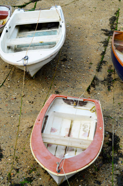 istock Boats  in a little harbor during an outflow, low water level 840327146