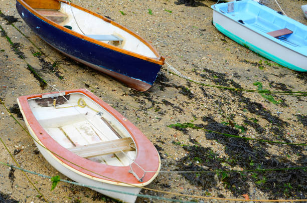 istock Boats  in a little harbor during an outflow, low water level 840327156
