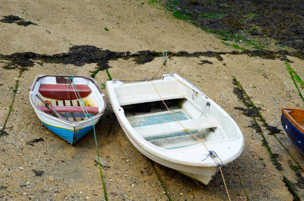 istock Boats  in a little harbor during an outflow, low water level 840327270
