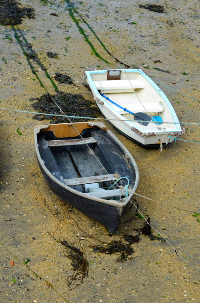 istock Boats  in a little harbor during an outflow, low water level 840327494