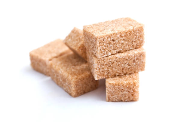 istock group of brown cane sugar cubes on white background 840330270