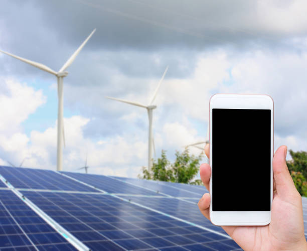 istock solar panels and wind turbines with the clouds and sky 840333096