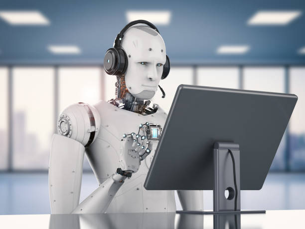 istock robot working with headset and monitor 840333536