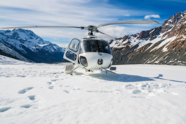 istock Helicopter Landing on a Snow Mountain 840333920