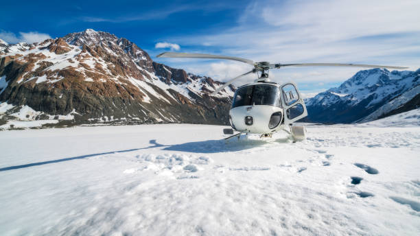 istock Helicopter Landing on a Snow Mountain 840333958