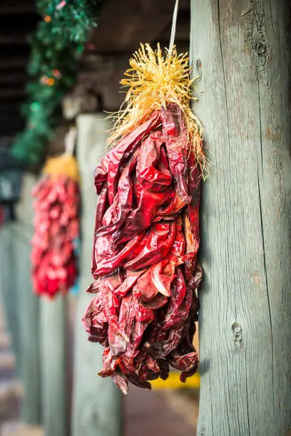 Red chile ristras is hanged in front of a store in old town Alberqueque, New Mexico