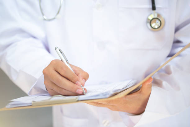 istock Doctor and stethoscope,Book report 840370668