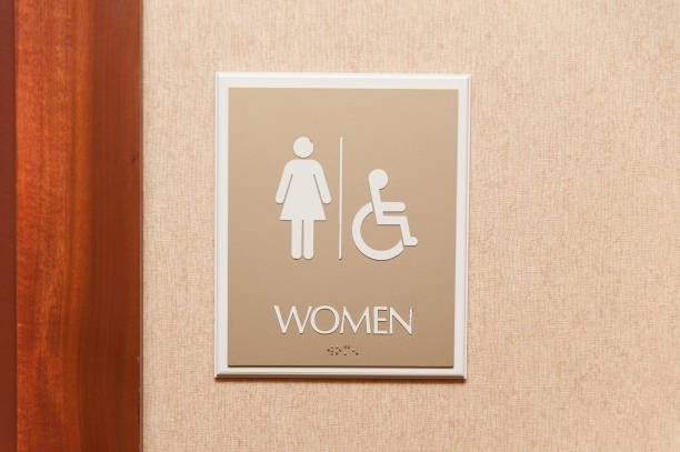 istock Women restroom sign close up 840376284