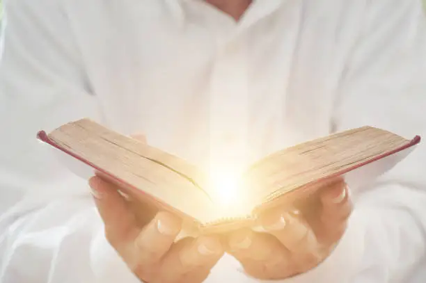 A man reading the Holy Bible.