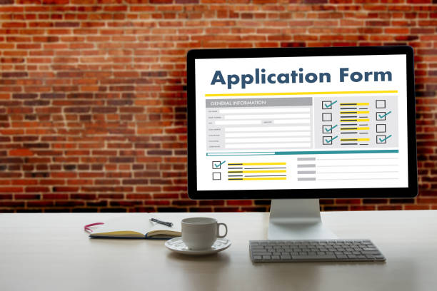 istock business man working on laptop computer use Online Web Job Application Form moniter 840379322