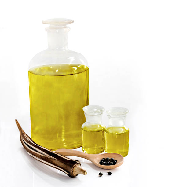 istock Abelmoschus esculentus / Okra seed and oil isolated on a white background. 840388002
