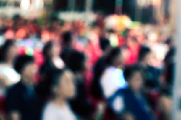 istock people on chairs with blurred images. 840388022