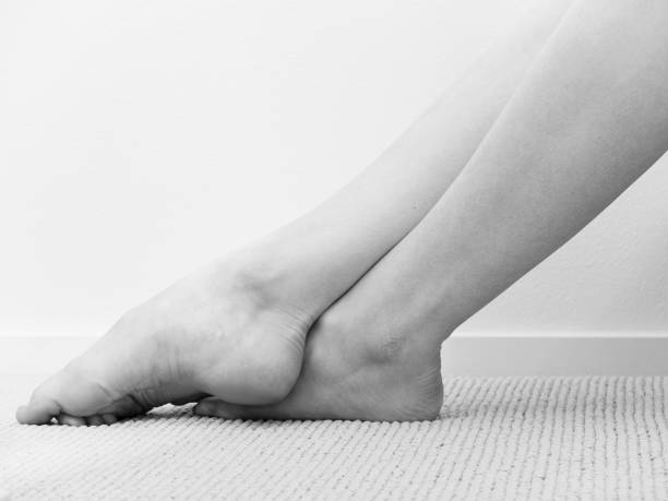 Ballerina resting her feet during break