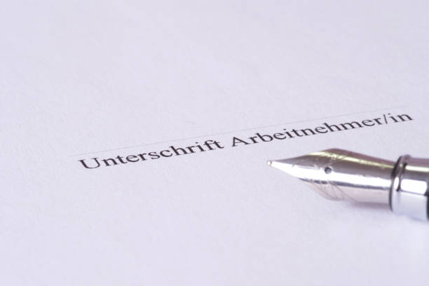 istock An employment contract and a pen 840400800