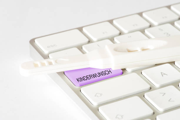 istock Pregnancy test, computer and desire to have children 840404456