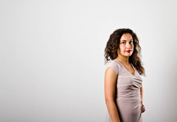 istock Young woman is standing. Young woman doing something. 840404538