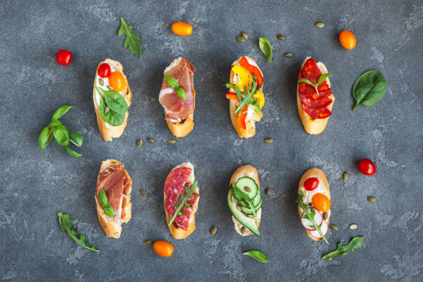 istock Traditional spanish tapas on dark background. Flat lay, top view 840409224