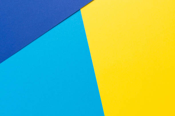 istock Color papers geometry flat composition background with yellow and blue tones 840413072