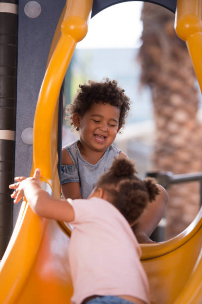 istock Little girl helping friend while playing. 840416408