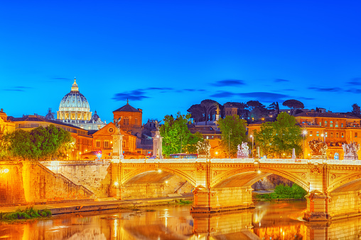View on Bridge Vittorio Emanuele II (Ponte Vittorio Emanuele II) and Vatican city St. Peter's Basilica (Basilica di San Pietro) . Rome.