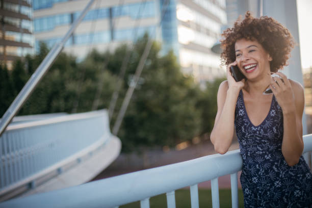 istock Woman talks on cell phone 840427216