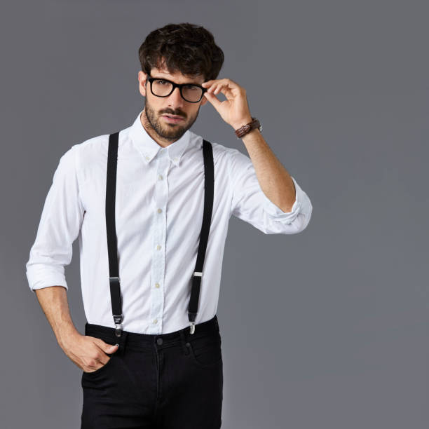 istock Confident young businessman holding eyeglasses 840428334