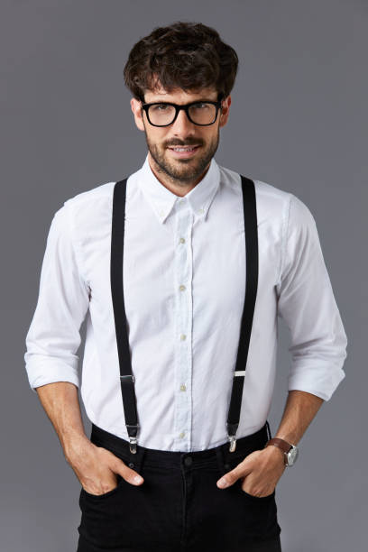 istock Young businessman standing with hands in pockets 840428368