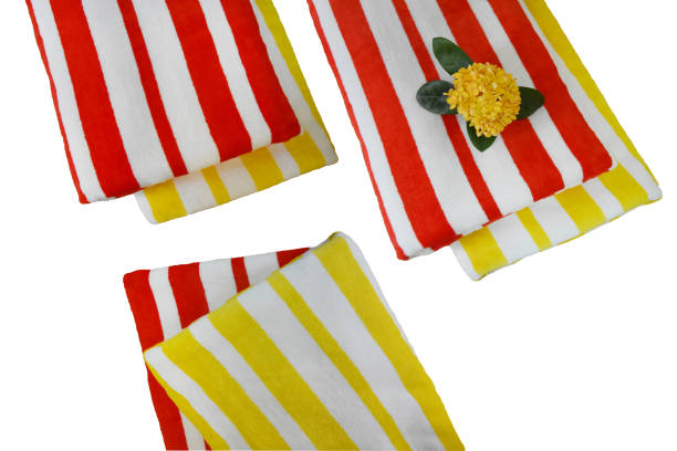 istock Top view bright towel striped red yellow white ,isolated on white background with clipping path.  For web design or graphic art image. 840428474