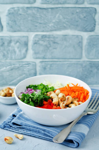 istock Cabbage carrot red bell pepper cashews salad 840431890