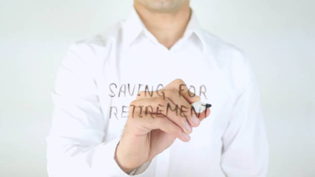 istock Saving For Retirement, Man Writing on Glass 840432392