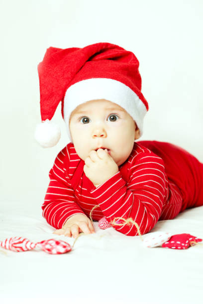 istock Cute child in Santa hat 840432454