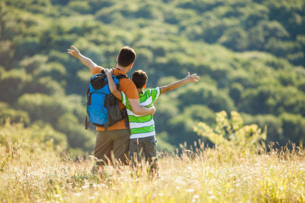 istock Father and son in nature 840435398