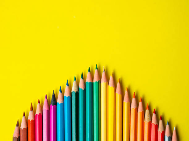 istock Colored pencil on yellow paper background for drawing color circle 840436494