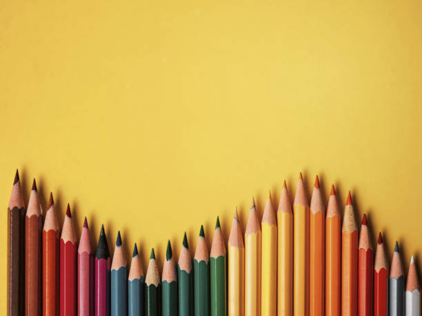 istock Colored pencil on yellow paper background for drawing color circle 840436548