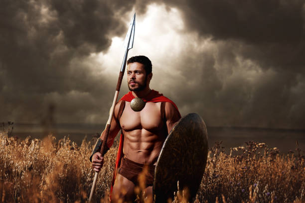 istock Muscular medieval warrior standing in the field 840439278