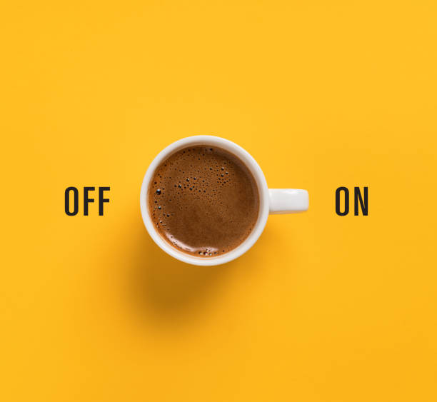 Coffee for morning Cup of coffee on yellow background like switch button mug photos stock pictures, royalty-free photos & images