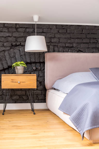 istock Cozy bedroom with brick wall 840452650