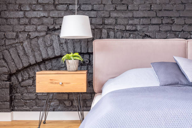 istock Bedroom with wooden bedside cabinet 840454460