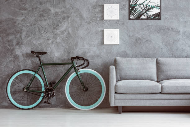 istock Bike next to grey sofa 840456622