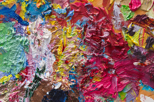 istock Palette with colorful mixed oil-paints texture 840457294