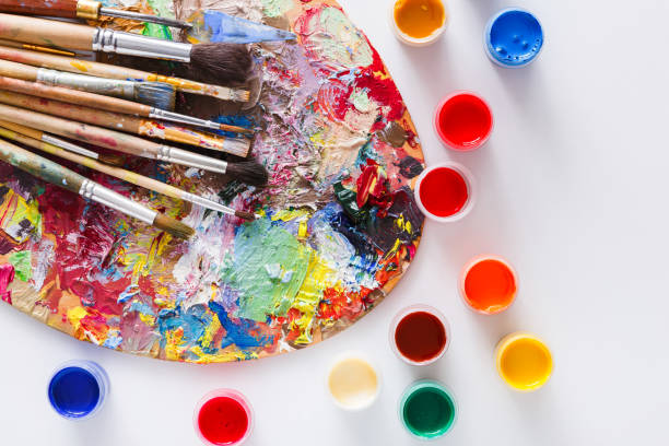 istock Art palette with colorful paint strokes, isolated 840457466