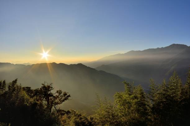 istock Foggy valley sunrise 840457648