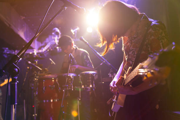istock Woman Playing The Guitar 840458858